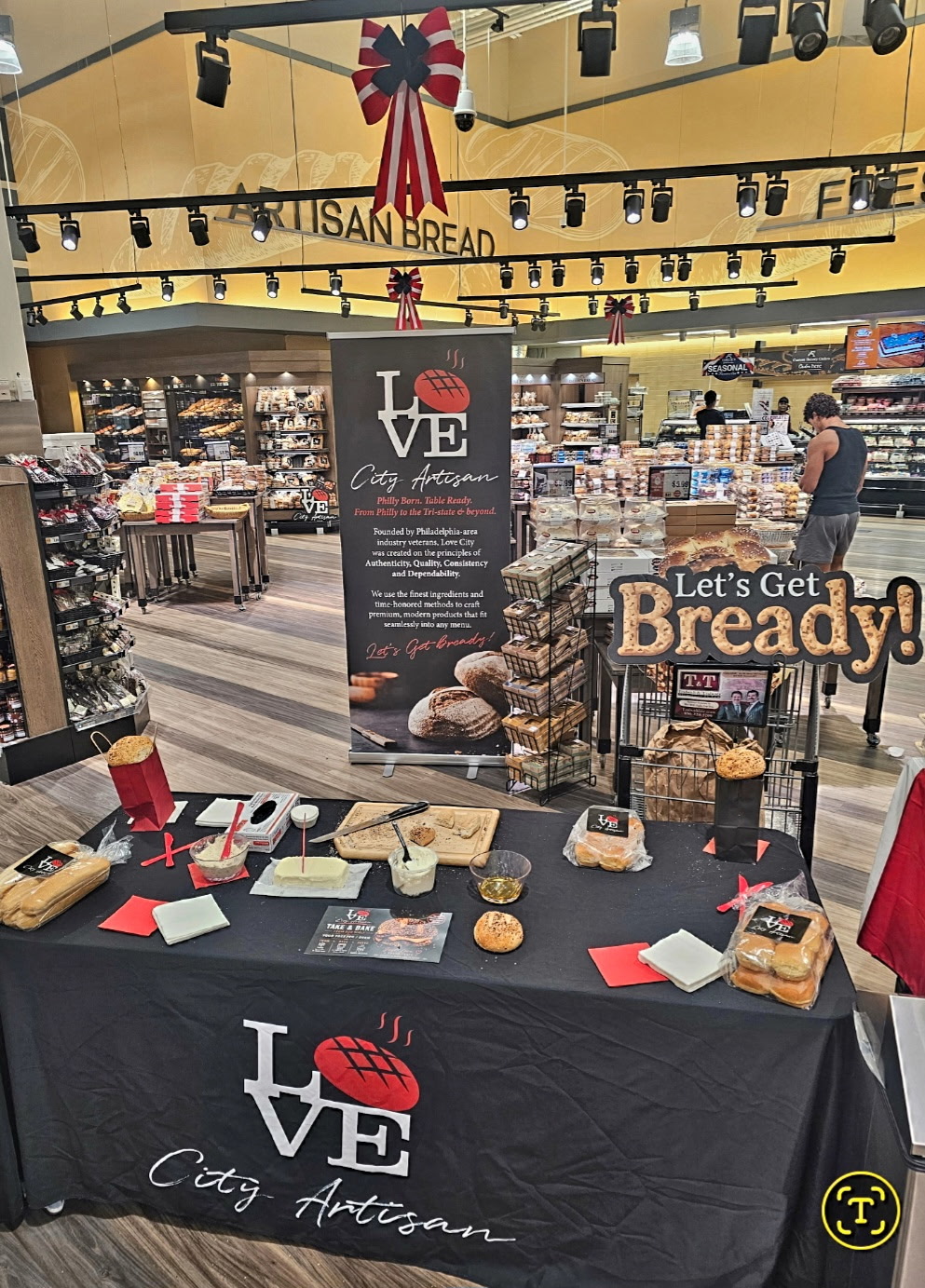 Love City Artisan promotional booth set up inside a ShopRite store